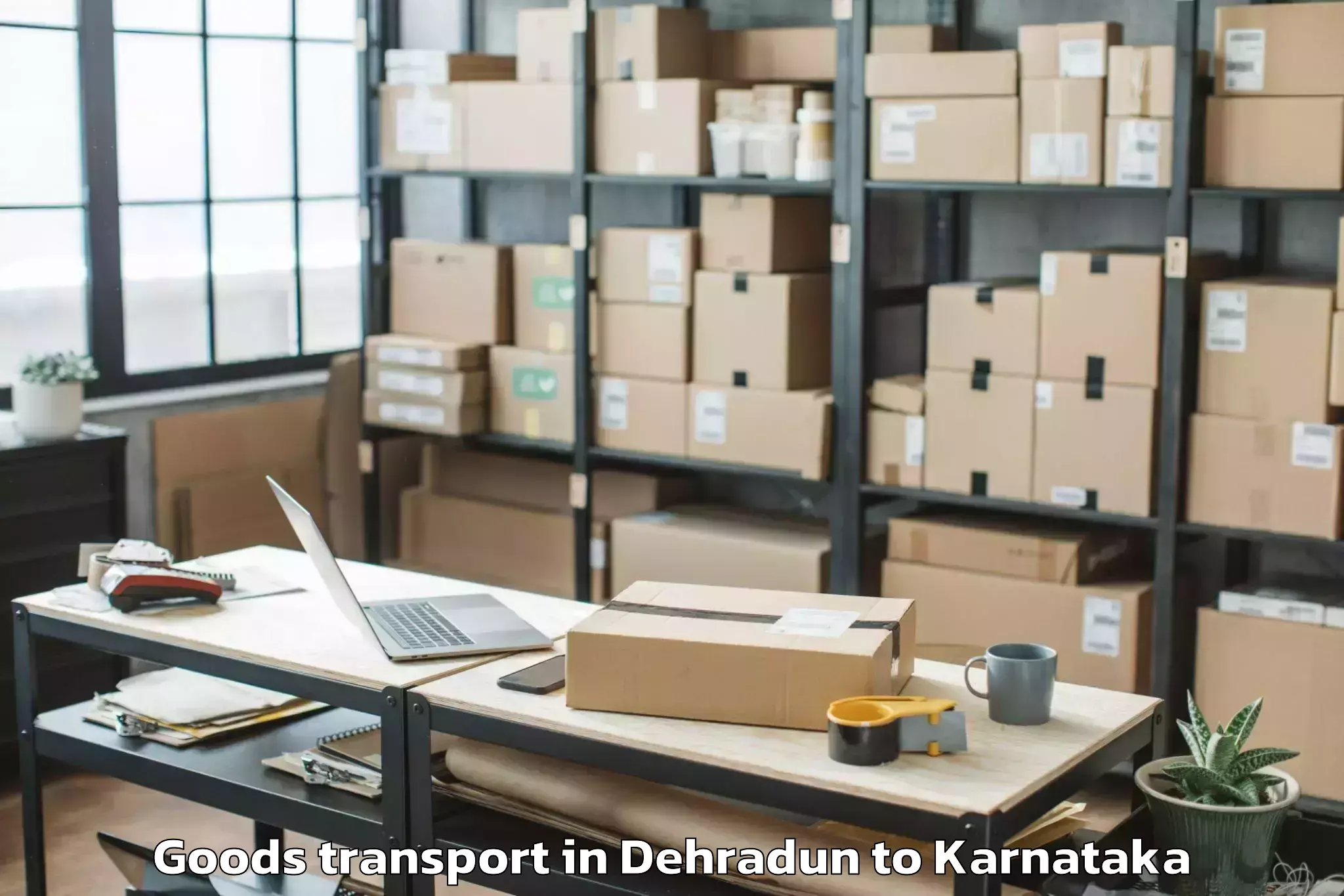 Trusted Dehradun to Maddur Goods Transport